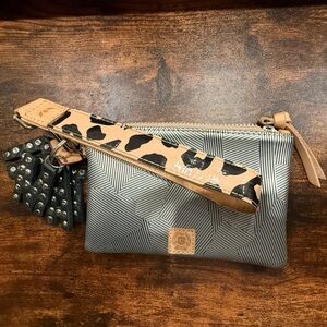 Consuela Silver and Tan Clutch Wristlet with leather charm “MTRA” new condition